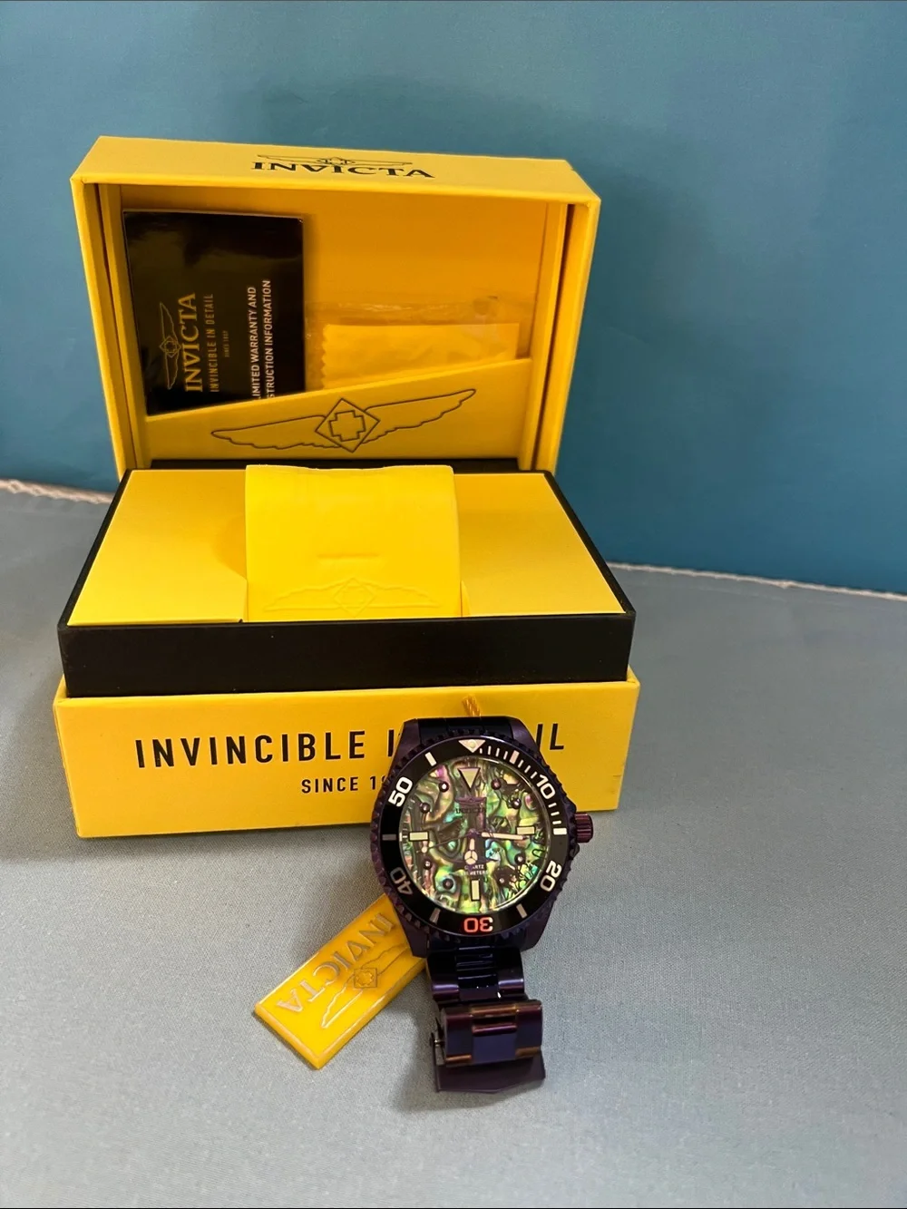 Invicta Men's Watch with Iridescent Green Abalone Face & Dark Purple Steel Band